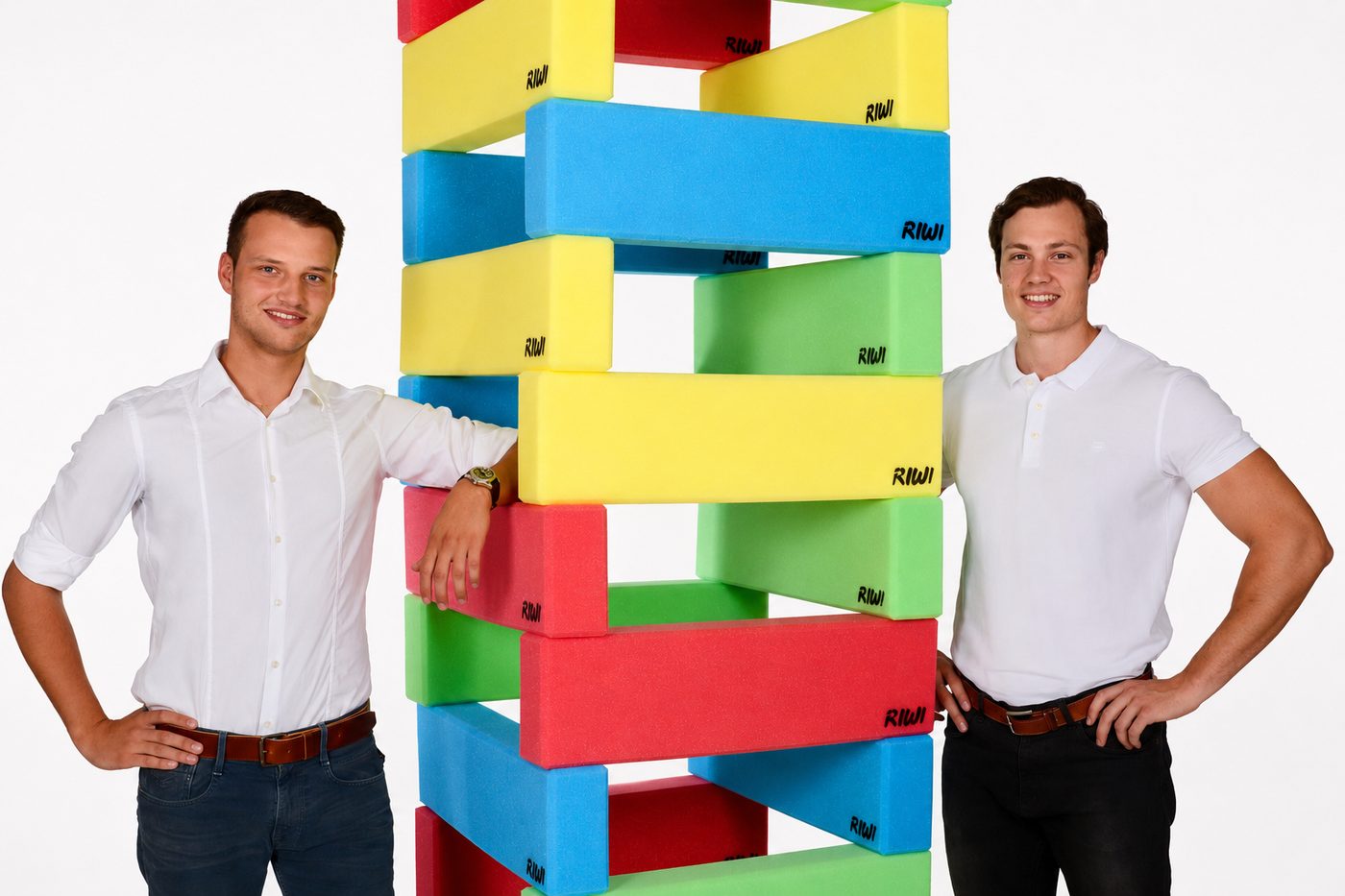 RIWI® founders Roland (left) and Nicola (right) next to a RIWI block tower